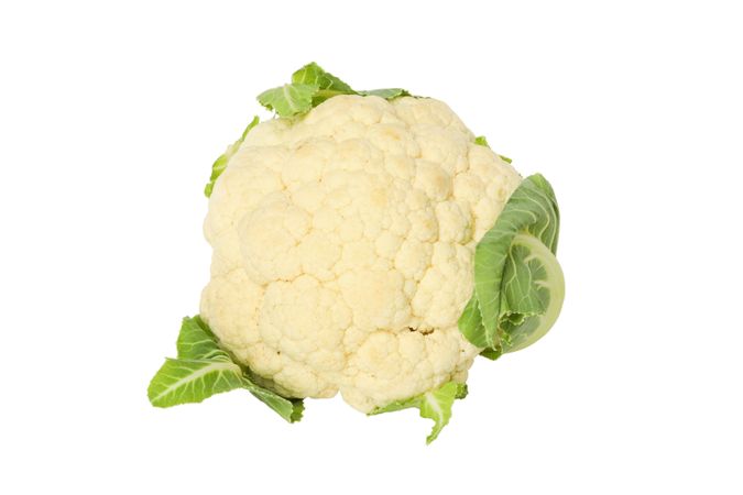 Whole cauliflower with leaves, isolated on plain background