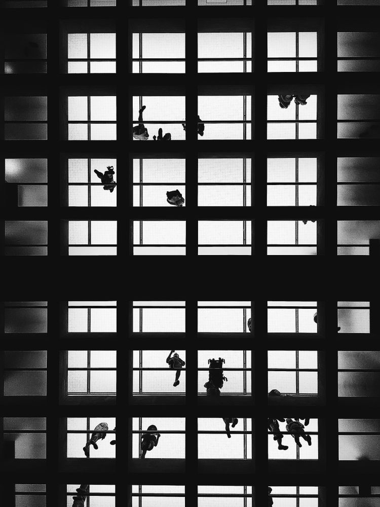 Interior view of modern building with see through ceiling in grayscale