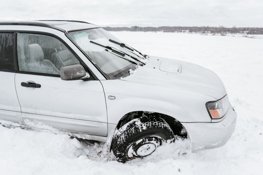 Car driving on snow field
