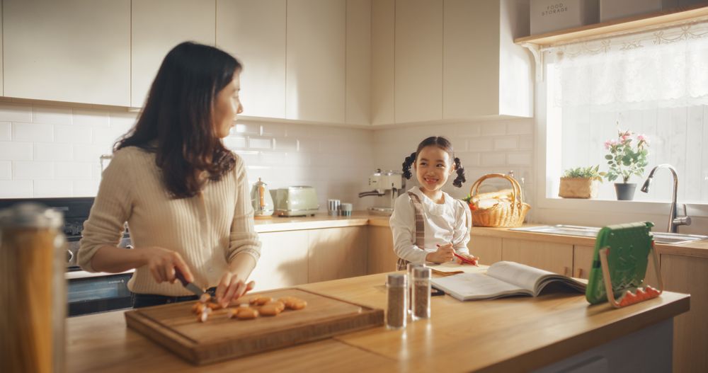 Portrait of a Korean Woman and her Daughter in the Kitchen at Home