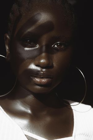 Portrait of African woman in light top