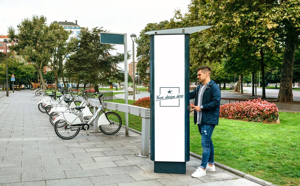 Man renting bicycle in a customizable post