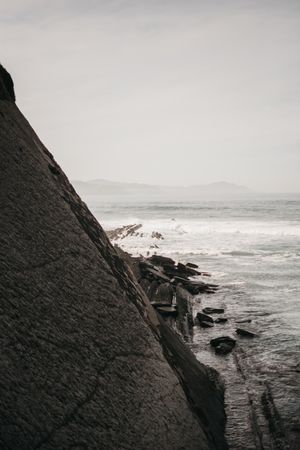 Cliff near stormy sea