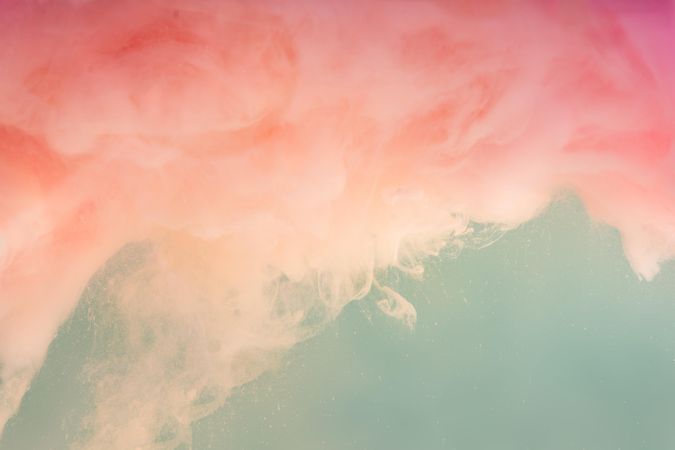 Cloud-like pastel pink color paint with teal background