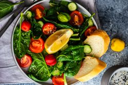 Fresh organic salad with spinach and tomatoes