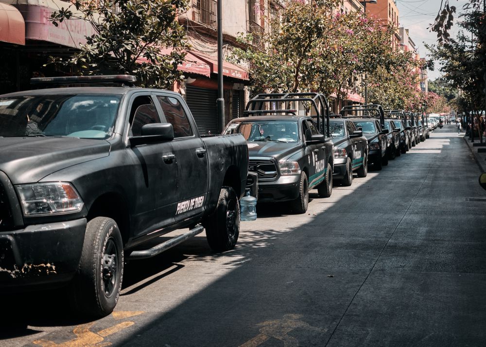 Mexico City, Mexico - February 26th, 2022: Police cars parked all the way down street during protest
