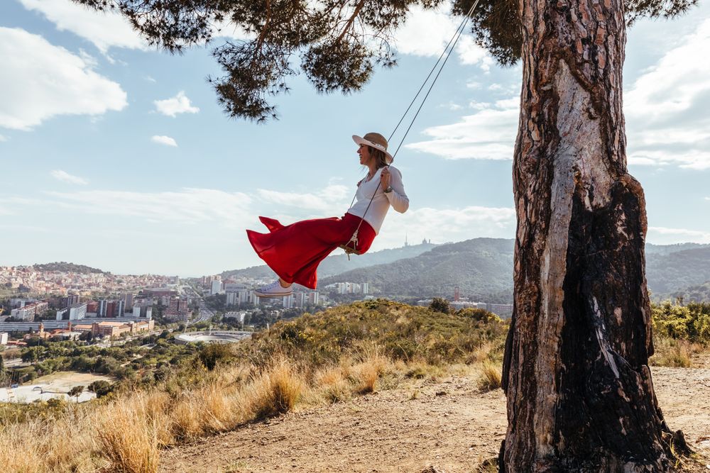 Female having fun on a swing