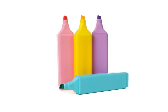Different color highlighters isolated on blank background