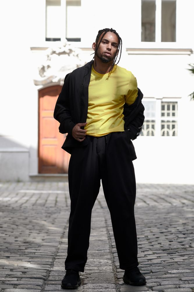 Black male standing on the street
