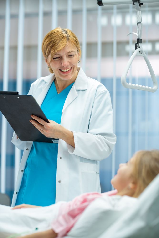 Sick Little Girl Lies on a Bed In the Hospital