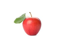 Red apple with leaf isolated on light background