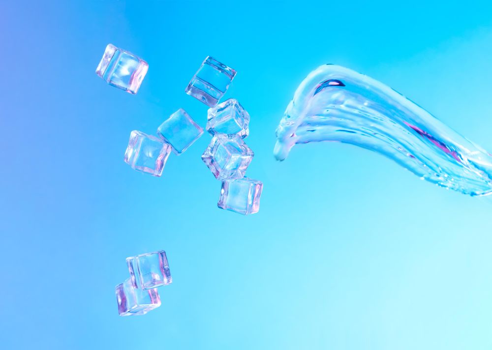 Ice cubes and splash of water in vibrant bold gradient purple and blue holographic color lights