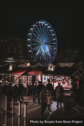 People walking in an amusement park during night time 5lKya0
