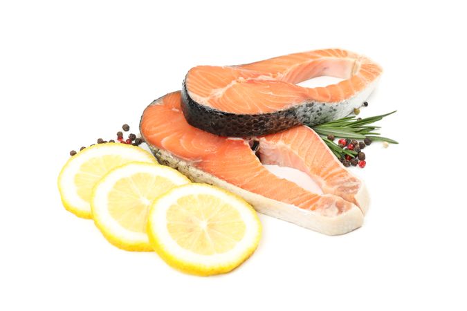 Fresh raw salmon meat and spices isolated on plain background