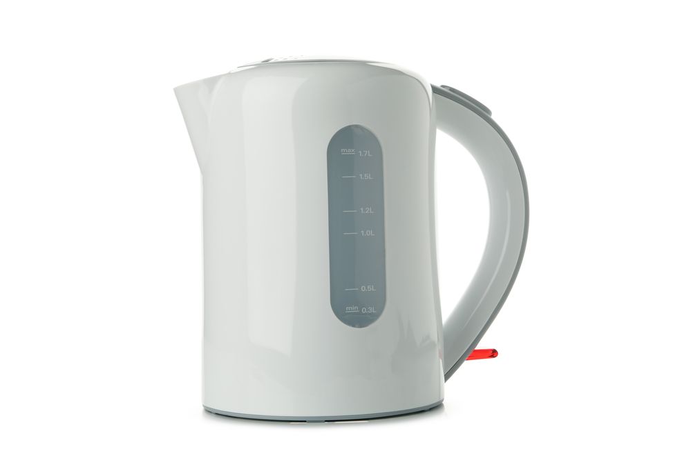 Modern electric kettle isolated on light background