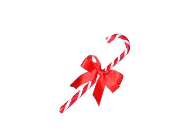 Sweet candy cane with bow isolated on blank background