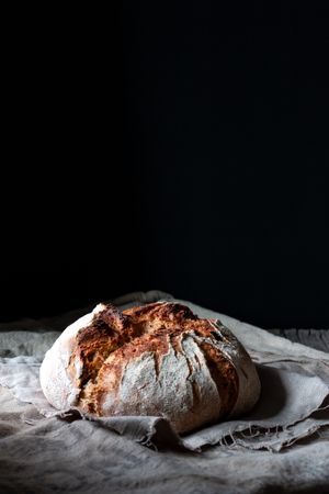 Country sourdough bread on wood