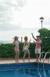 Group of friends having a pool party