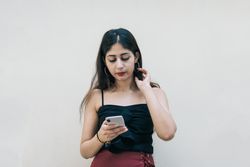 Woman holding smartphone