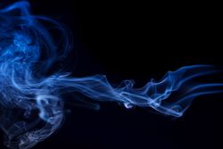Colorful smoke on dark background