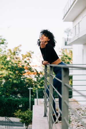 Stylish Black female on balcony
