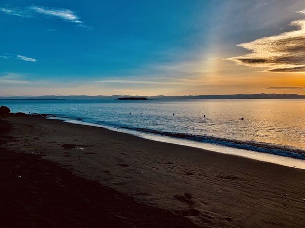 Sunset and sunrise beach shore view