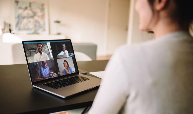 Woman having a video conference with friends