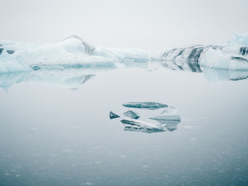 Ice on water between snow