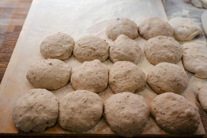 Loaf-shaped bread dough on the table