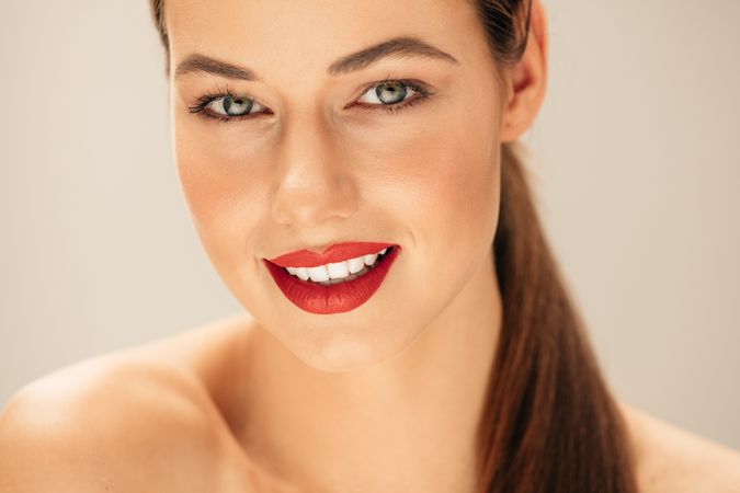 Close up portrait of woman in studio with classic makeup