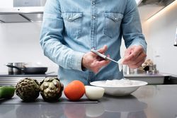 Cropped shot of man prepping seafood