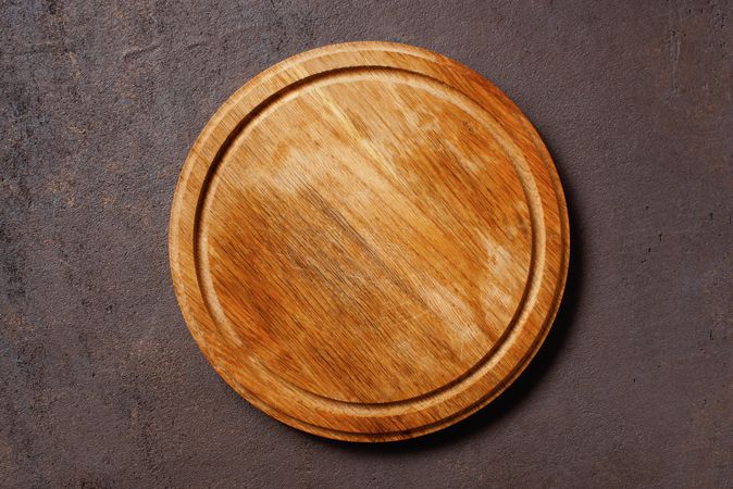 Plain wooden circular breadboard