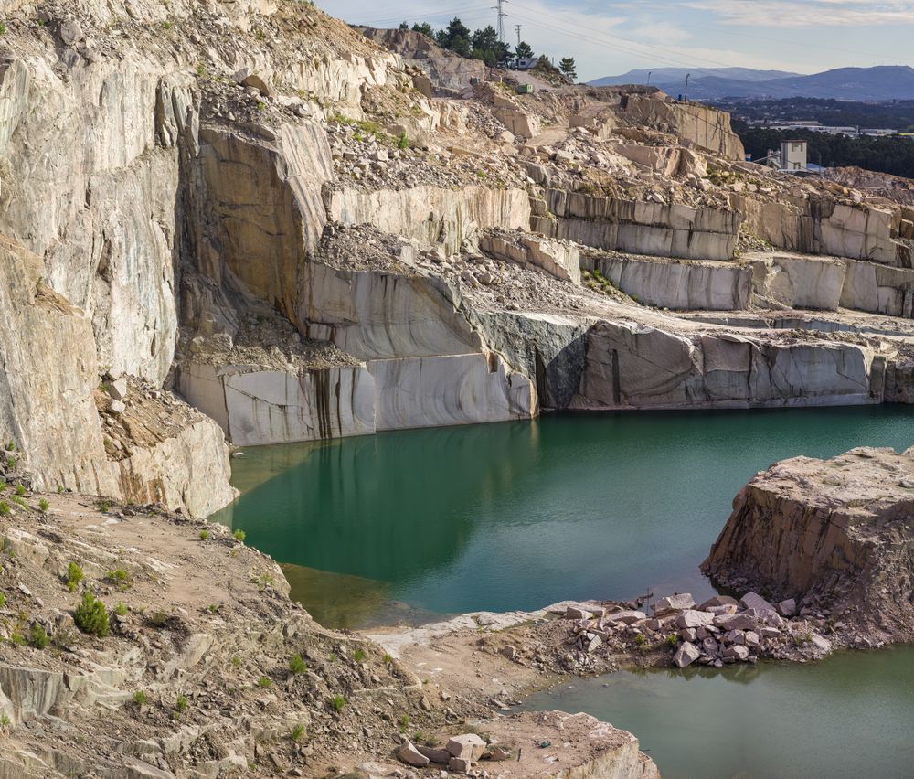Calm water near stone quarry