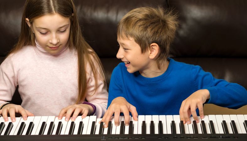 Joyful Siblings Piano Practice