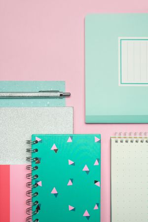 School stationery set on pink background