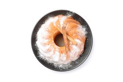 Cake with powder sugar and cinnamon isolated on plain background