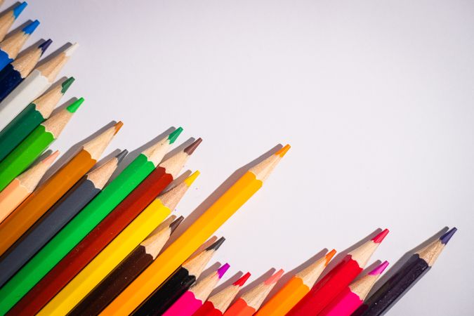 A row of pencils with one pencil standing out