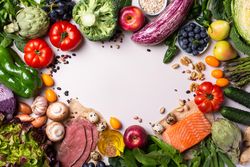 Assortment of healthy food ingredients for cooking, flat lay, top view with copy space