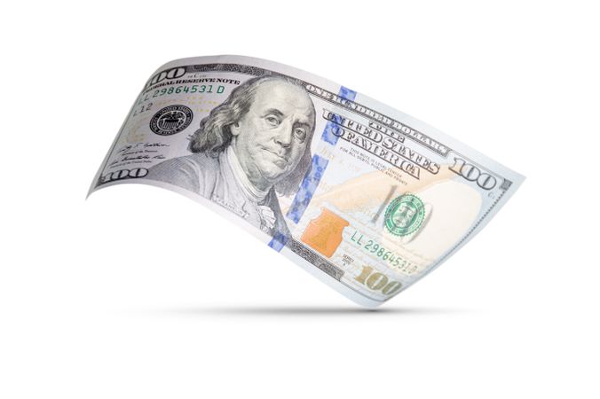 One Hundred Dollar Bill Floating Down To Surface with Drop Shadow