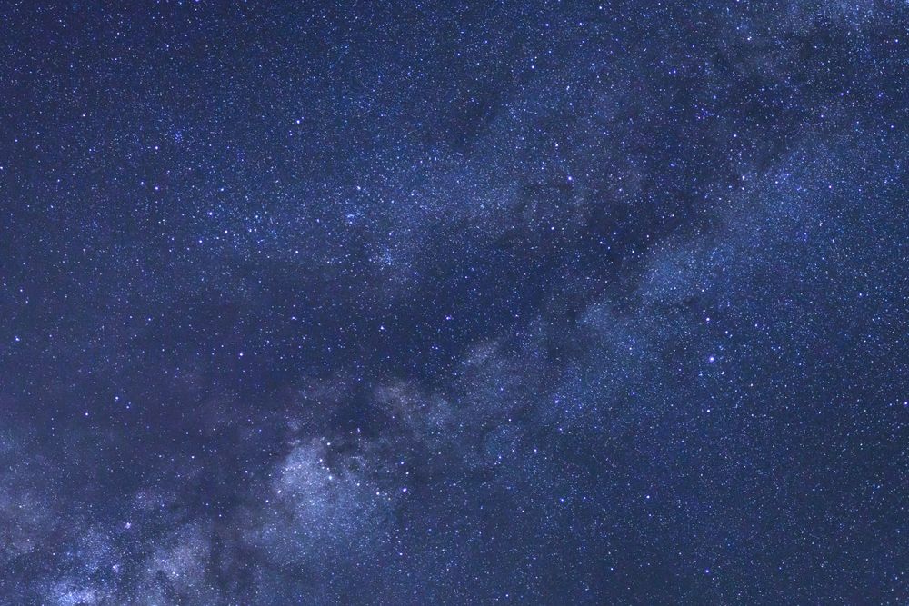 Starry night sky and milky way galaxy with stars and space dust in the universe