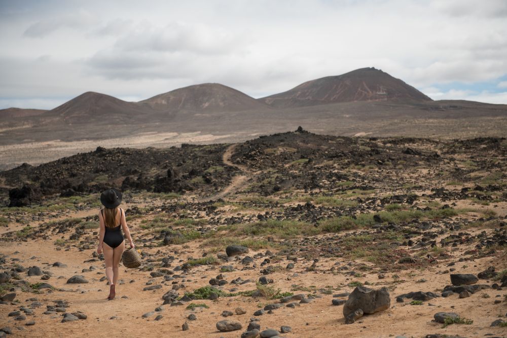 woman in swimwear in countryside