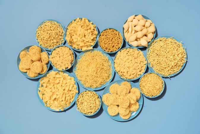 Pasta variety top view on a blue background