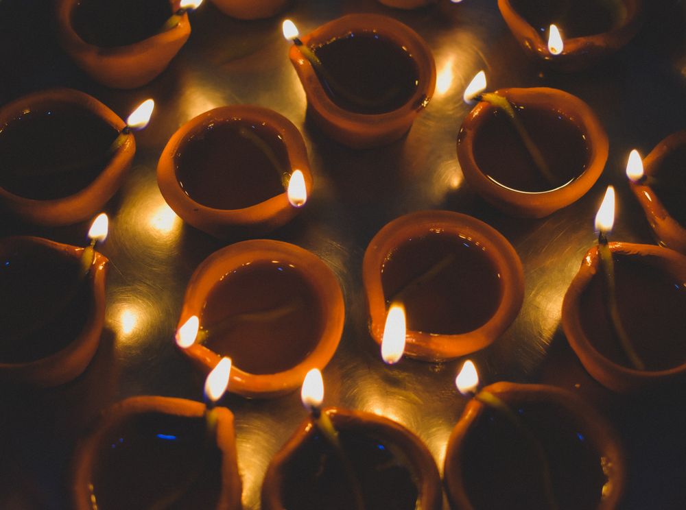 Top view of lit diyas