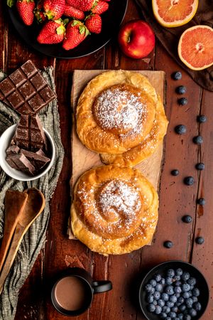 Breakfast food and drink on wooden table
