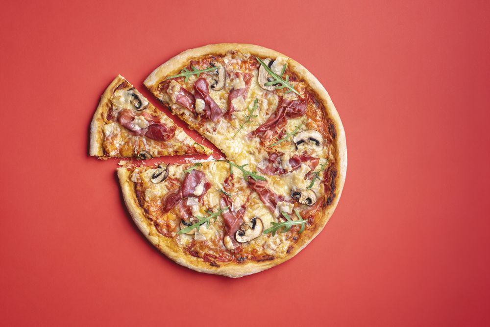 Homemade prosciutto  and mushroom pizza