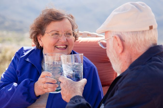 Happy Mature Adult Couple with Drinks