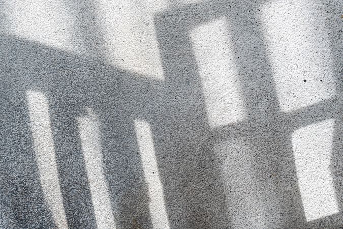 Shadows from the window on concrete wall