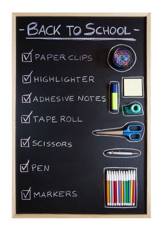 School supplies over chalkboard background