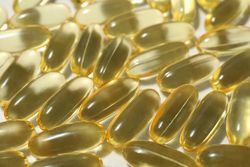 Omega pills close-up on a light background