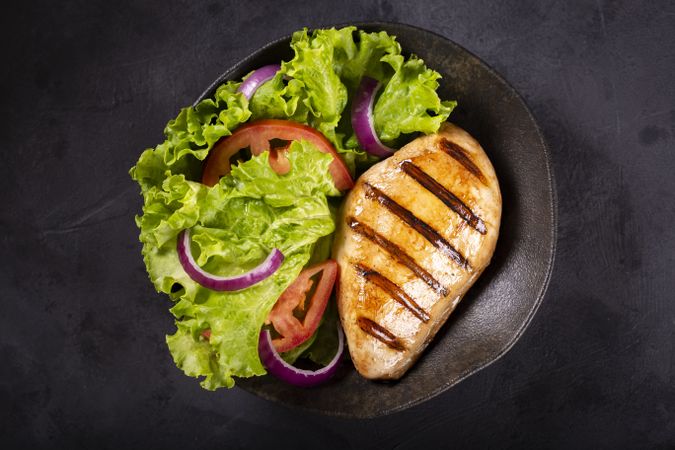 Tasty grilled chicken with salad.